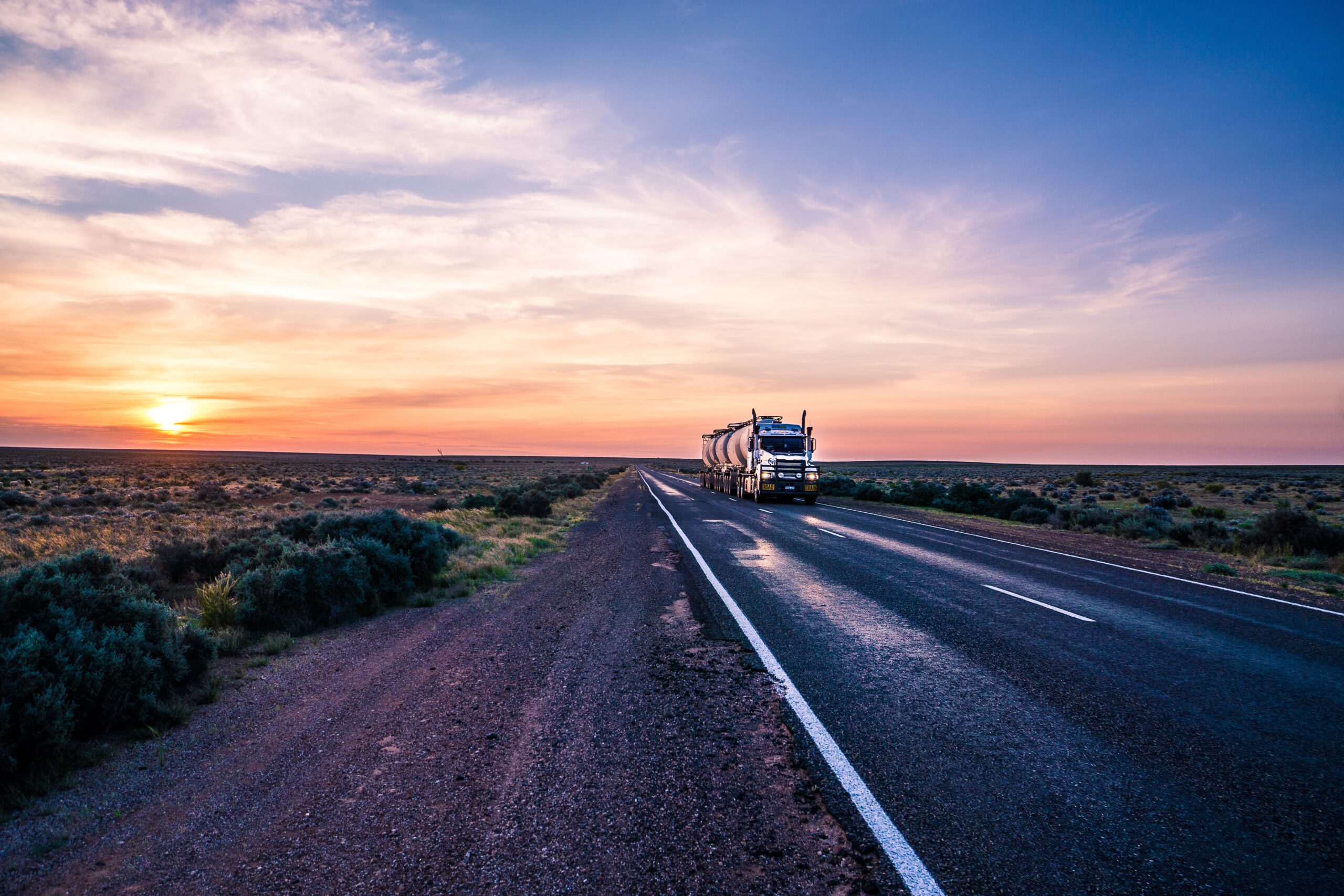 Truck driving on long regional Australia road